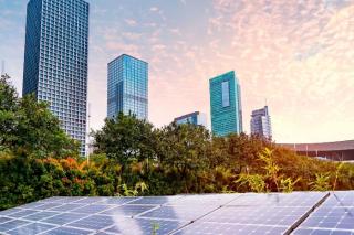 Solar panels with city skyline