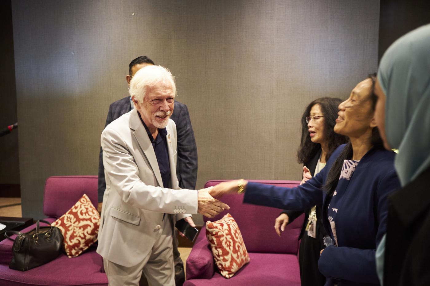 Prof Sibrandes Poppema (President of Sunway University) being greeted at the event